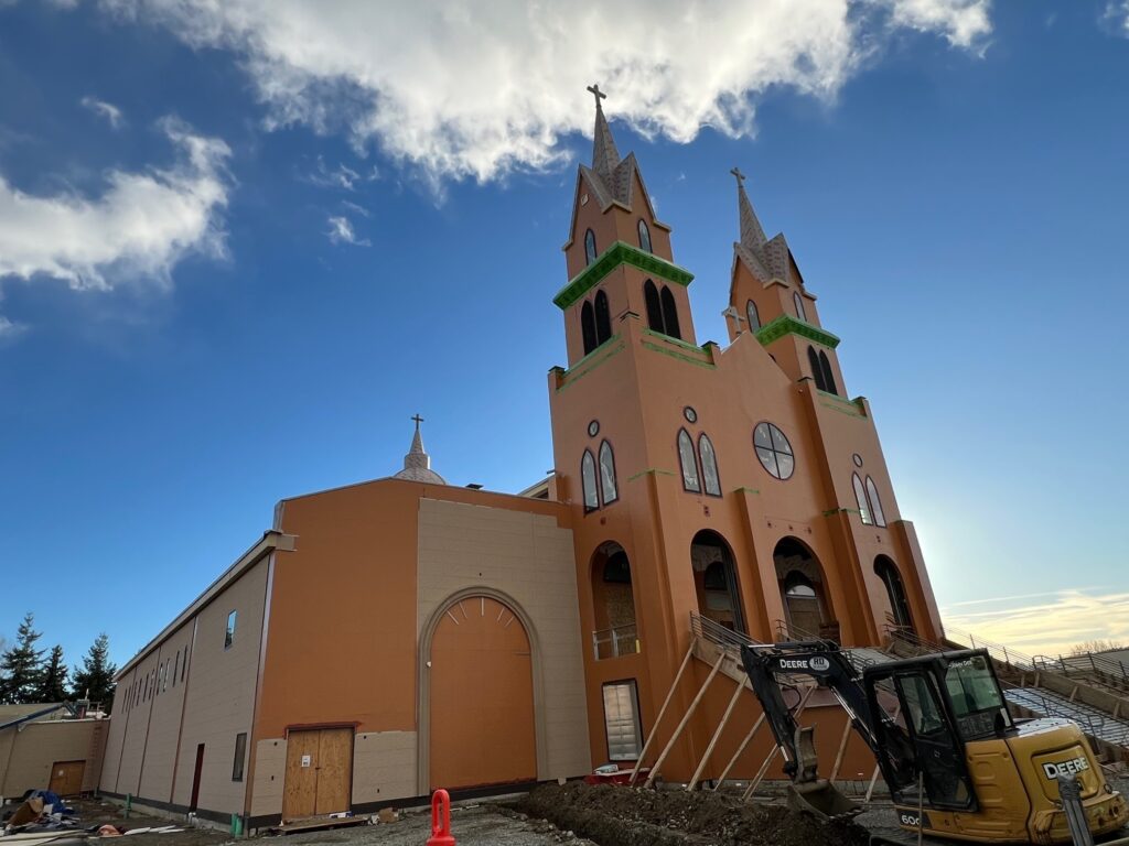 Front of the VMP church. It is currently light brown and in construction.